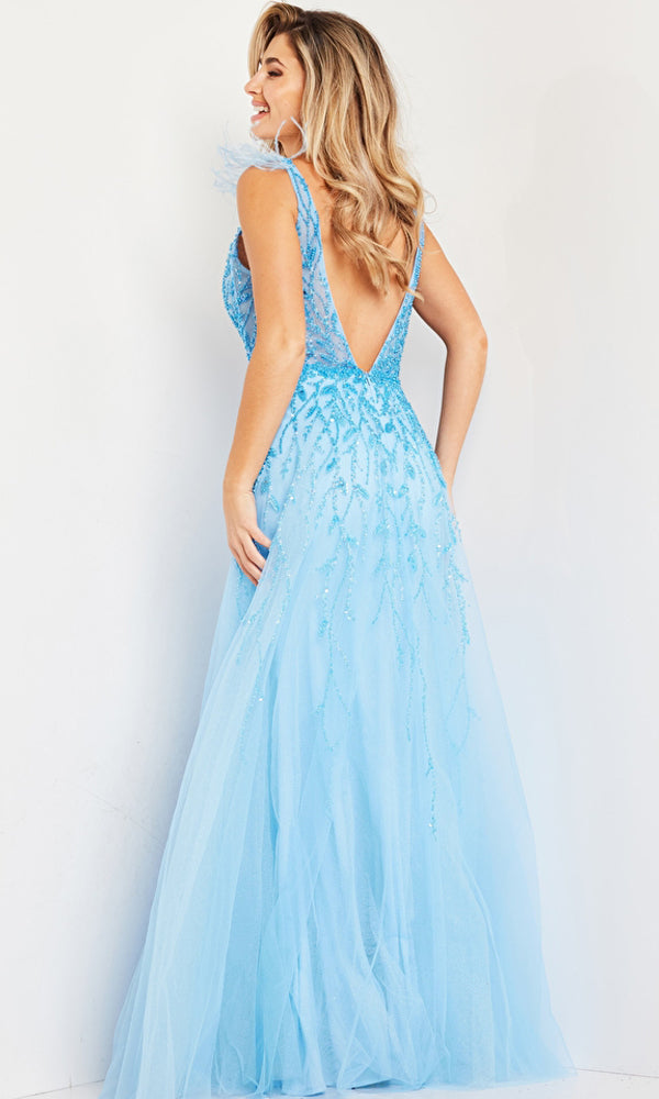 Woman wearing the Long Prom Dress 38430 by Jovani, an A-line gown in light blue with a v-neckline, deep V-back, and sequin details, standing against a plain white background.